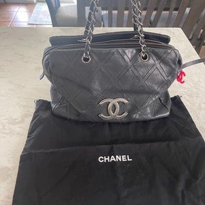 Authentic Chanel large black calfskin diamond tote